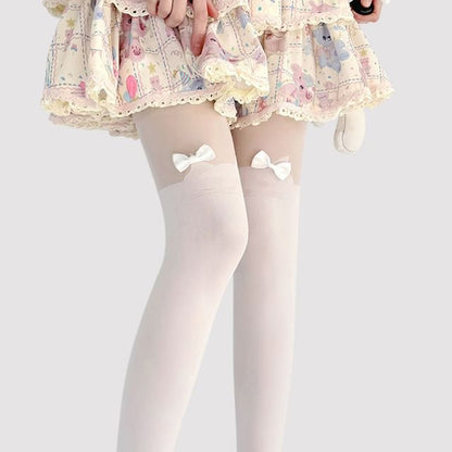 Transparente Strumpfhose mit Katzenmuster und Schleife