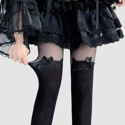 Transparente Strumpfhose mit Katzenmuster und Schleife