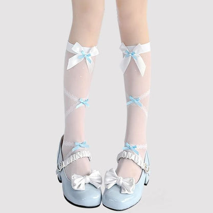 Hohe, transparente Kniestrümpfe mit Schleife