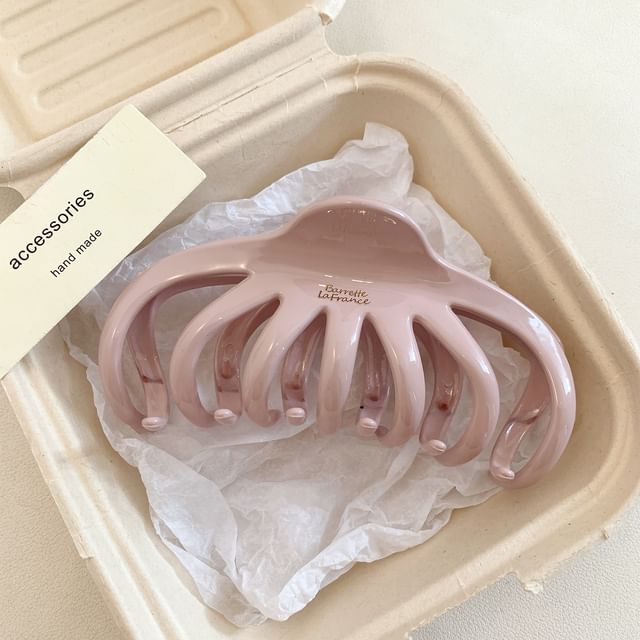 Haarkrallen-Schriftzug