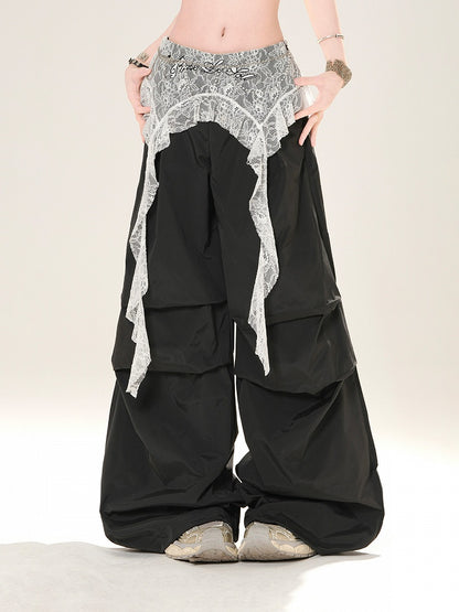 Grau/schwarze Hose mit weitem Bein und niedriger Leibhöhe und Spitzen-Accessoire an der Taille