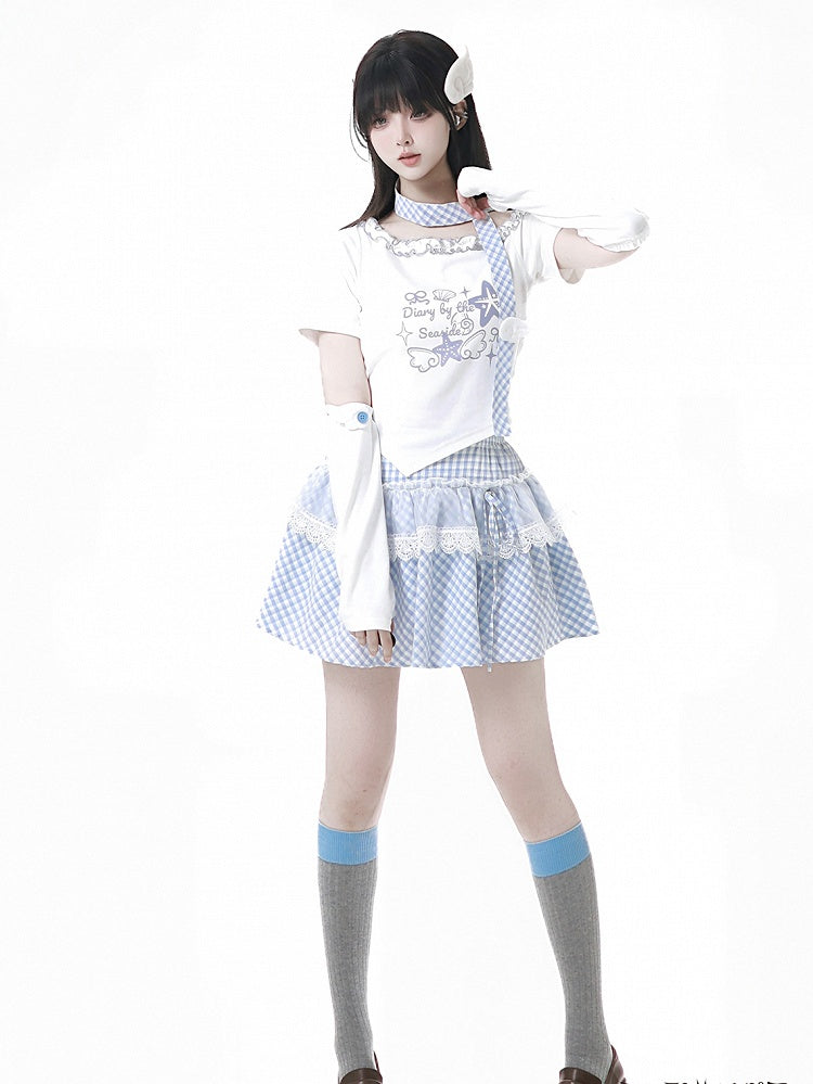 ブルーとスカーフのチェック柄、ピンク/ベビーヒトデと貝殻のプリント、フリル、アシンメトリーネックラインのTシャツ