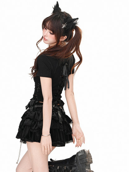 Rosa/schwarzes Crop-Top mit Strass-Buchstaben und Schnürdetail