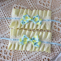 Gelb mit Zitronenmanschetten, Schleife, blauer Druck, Handgelenk, Rüschen