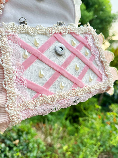 ライトピンクのリボンがアクセントのストロベリーチャームが可愛いロリータバッグ