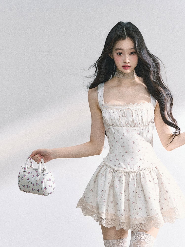 Weißes ärmelloses Kleid mit quadratischem Ausschnitt und Spitzenbesatz und Blumenmuster