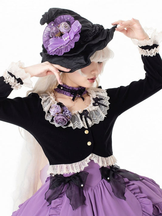 Schwarze, lange, gemütliche Strickjacke mit Schleifenärmeln und Spitzenbesatz, zarten Akzenten und