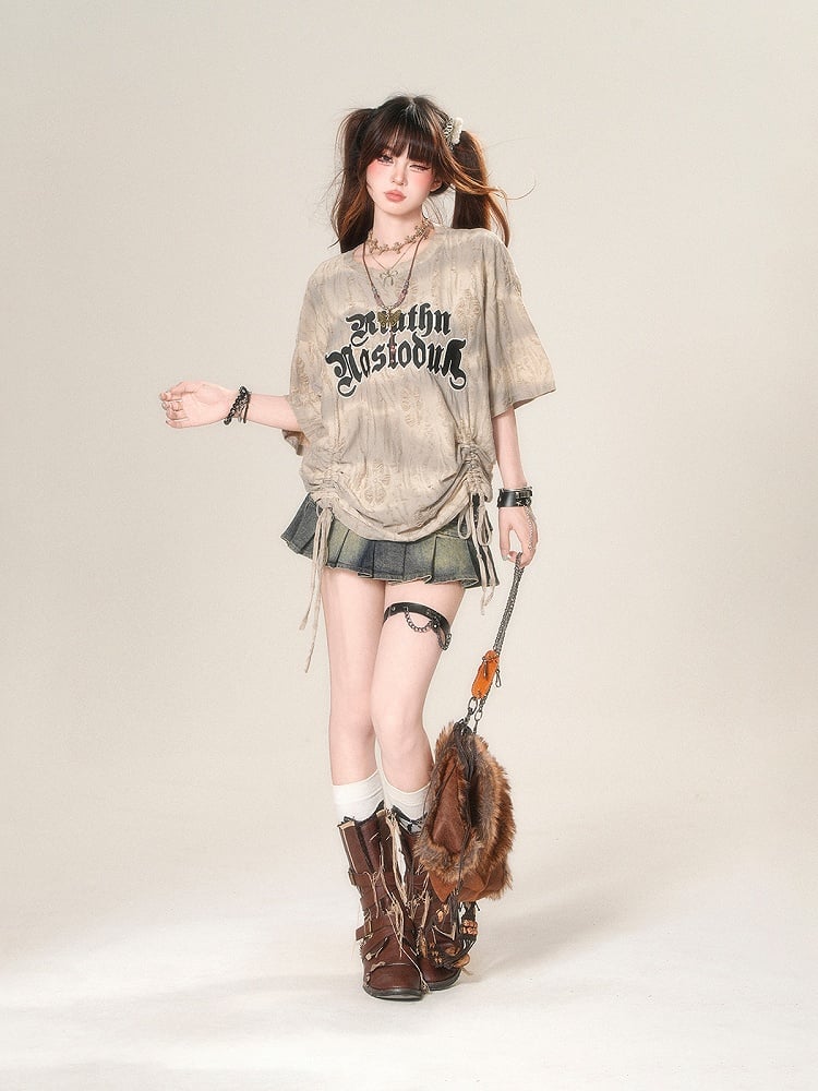 Lockeres T-Shirt mit apricotfarbenem Buchstabendruck und Kordelzug in der Taille und Löchern im Used-Look