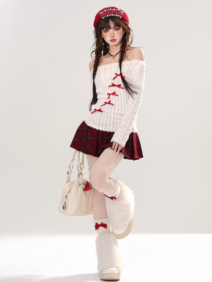 ホワイトのリボンディテール、オフショルダーネックラインセーター