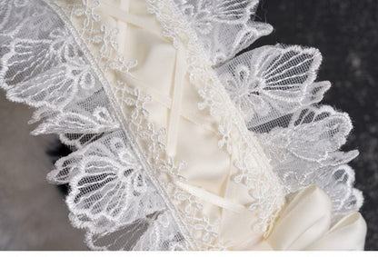 ホワイトハンドメイドのリボンクロスレーストリムプラッシュイヤーマフ