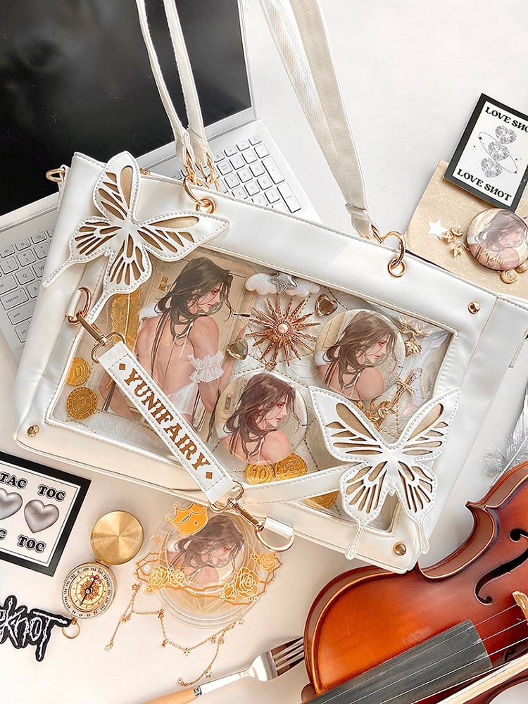 Abnehmbare Ita-Umhängetasche in Gold mit Schmetterlings- und Spinnennetz-Detail in Weiß