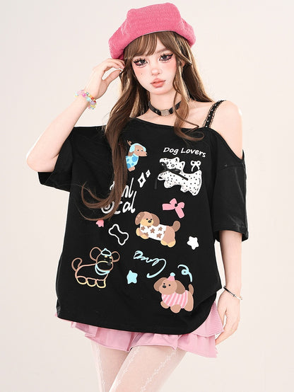 Weiß/Schwarzes lockeres T-Shirt mit asymmetrischem Ausschnitt und Cartoon-Welpen