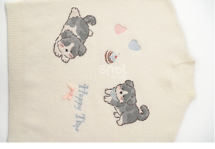 白いかわいい子犬柄のラウンドネックルーズセーター