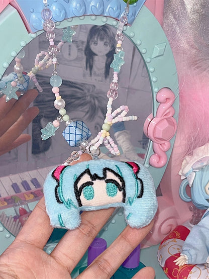 Verträumte Perlenkette mit Cartoon-Anhänger