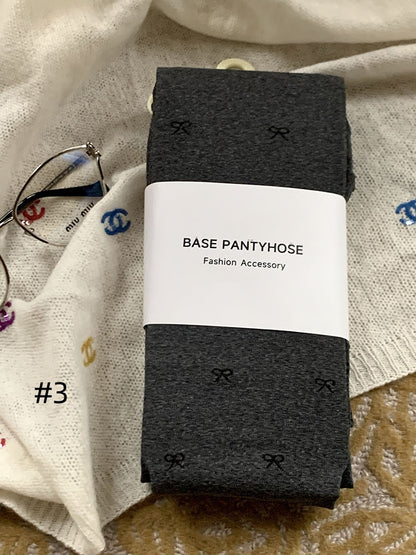 蝶結び柄タイツ