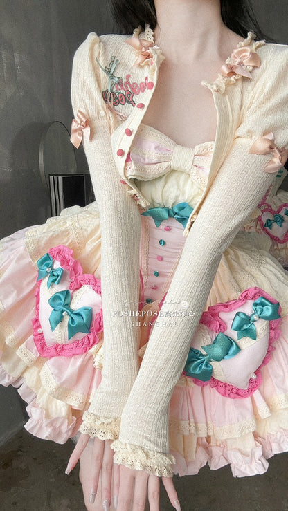 クリーム色の刺繍ディテールの長袖ニットトップス