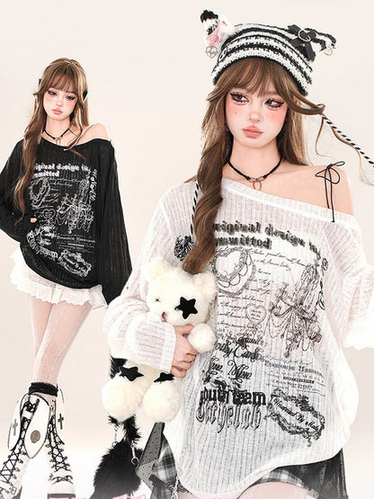 Schwarz/weißes, locker sitzendes, bedrucktes Oberteil mit asymmetrischem Ausschnitt