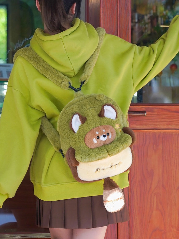 緑と茶色のかわいいレッサーパンダのぬいぐるみバックパック