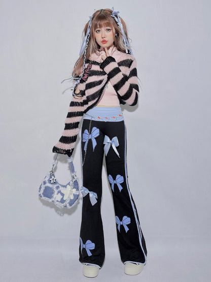 Schwarze Schlaghose mit hoher Taille und blauen Schleifen