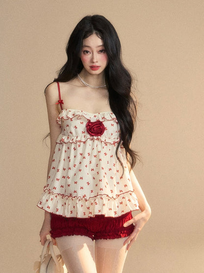 Aprikosenfarbenes Camisole mit Rüschen und rotem Schleifenmuster