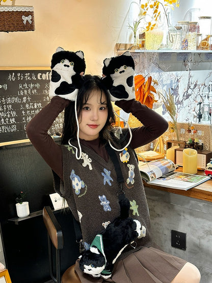 Schwarz-weiße süße Plüschhandschuhe in Katzenform