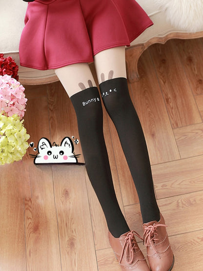 Weiß/schwarze Strumpfhose mit Hasenohren