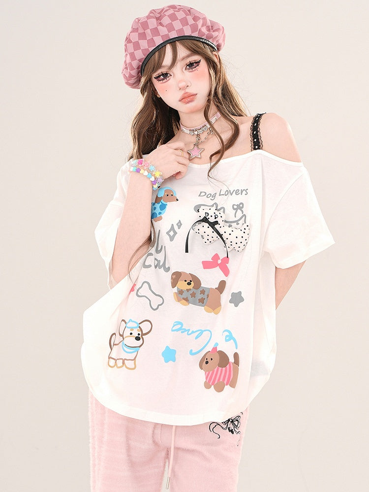 Weiß/Schwarzes lockeres T-Shirt mit asymmetrischem Ausschnitt und Cartoon-Welpen