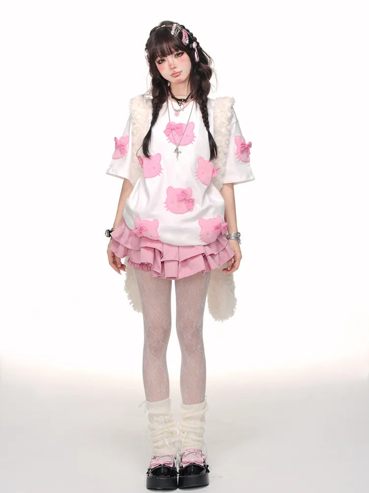 白/ピンクの蝶結びTシャツ柄 かわいい子猫