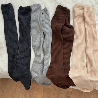 Gestrickte Beinwärmer in Weiß/Aprikose