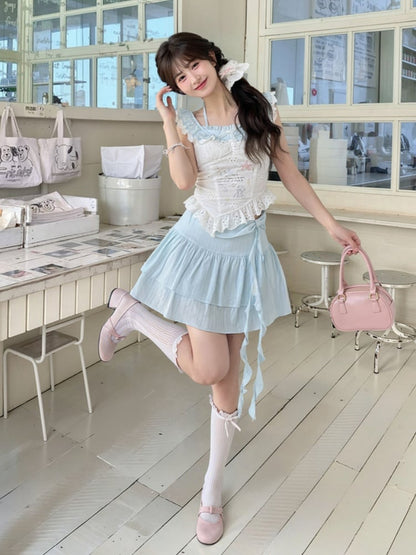 Ärmelloses Top mit gebogenen Ärmeln, weißem Saum, Seestern- und Quallen-Graffiti-Flatter