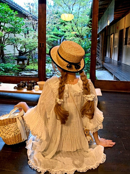 Straw Hat with Black Bowknot Detail - Lalacita
