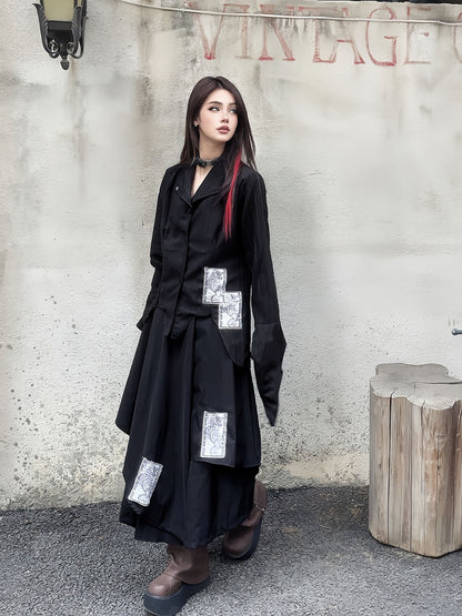 Schwarze asymmetrische Punk-Hose mit weitem Bein und Applikationen