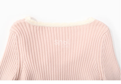 Rosa Strickoberteil mit Rundhalsausschnitt und schmaler Passform