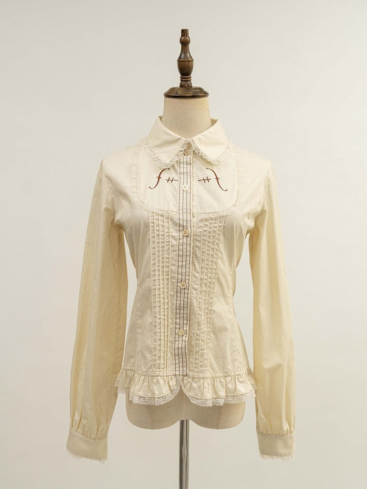 ベージュのプリーツボディス長袖シャツ