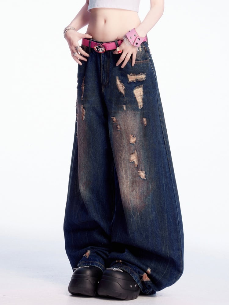 Dunkelblaue Vintage-Jeans mit weitem Bein und Distressed-Löchern
