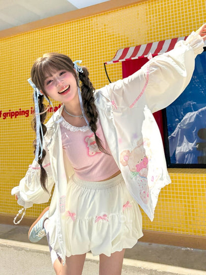 ピンクの蝶結びと白い伸縮性のあるウエストのバブルスカート