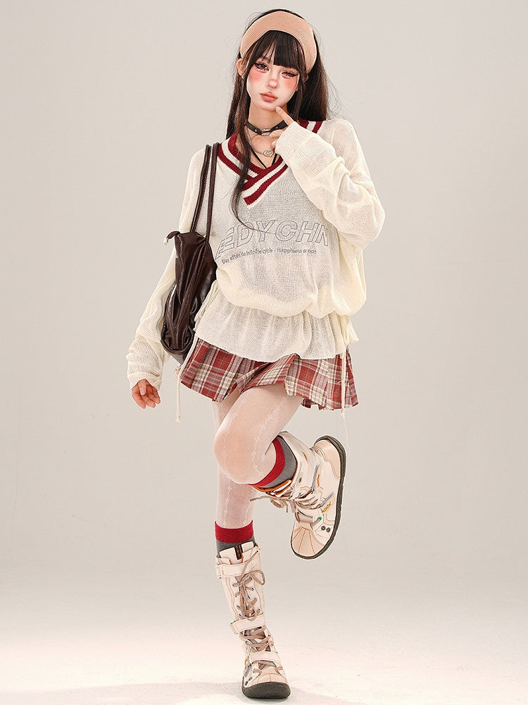 Aprikosenfarbenes, halbtransparentes, lockeres Strickoberteil mit V-Ausschnitt und gerüschter Taille