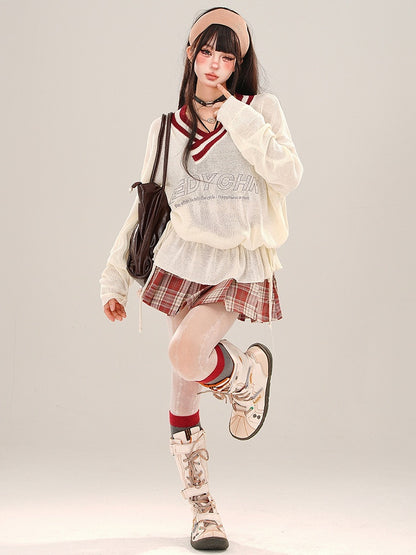 Aprikosenfarbenes, halbtransparentes, lockeres Strickoberteil mit V-Ausschnitt und gerüschter Taille