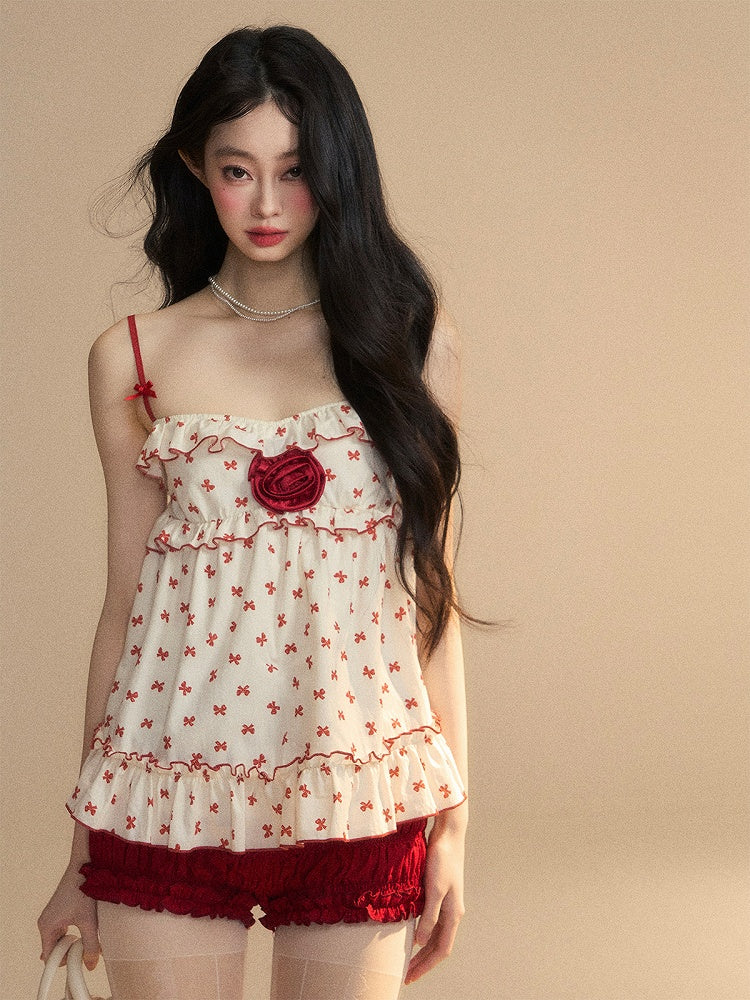 Aprikosenfarbenes Camisole mit Rüschen und rotem Schleifenmuster