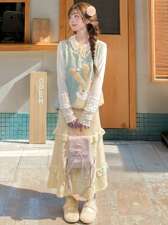 イエローのリボンがアクセントのハイウエストニットミディ丈スカート