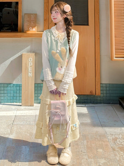 イエローのリボンがアクセントのハイウエストニットミディ丈スカート