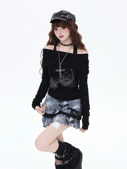 ブラックのオフショルダーネックラインの蝶結びプリントトップス