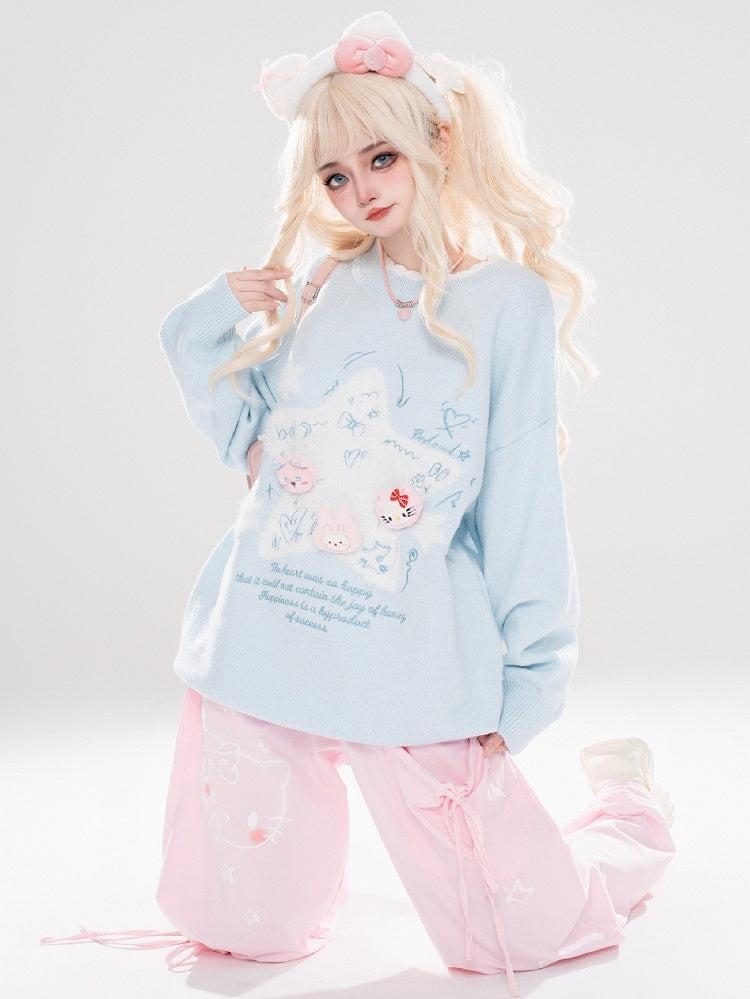 ライトブルー/ライトイエローの星のアップリケがキュートな猫ちゃんをあしらったゆったりセーター