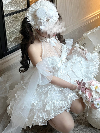 Weiße Handfesseln mit Schleife