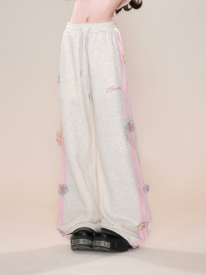Grau-rosa Hose mit geradem Bein und Blumenmuster