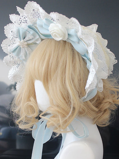 ピンク/ブルーの花柄リボンディテール、レーストリムのボンネット