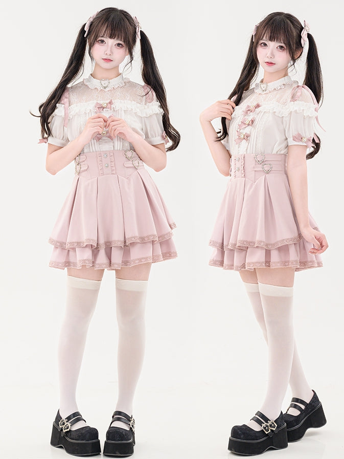 蝶結びのショート丈ジライラインストーンシャツプリーツピンクのディテール袖装飾ケイハート