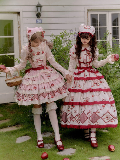 ピンクと赤のリンゴ柄の三角スカーフ