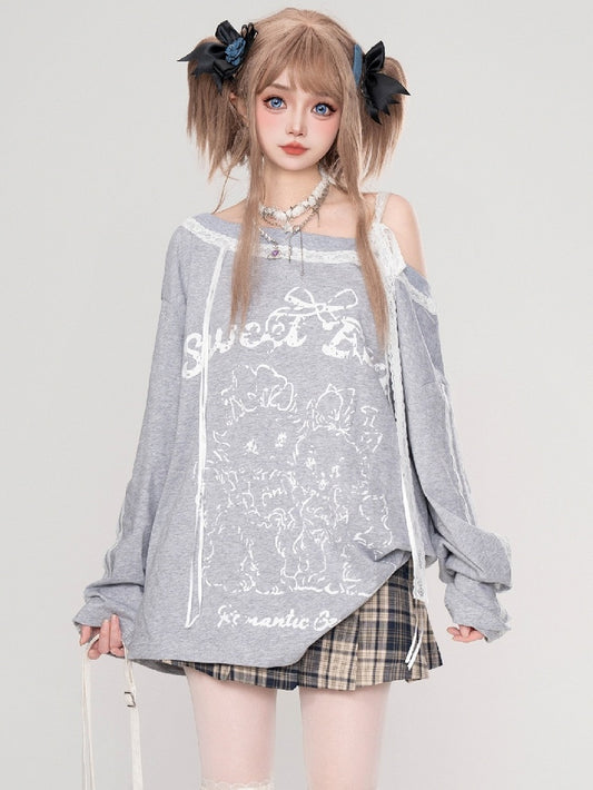 Graues Top mit asymmetrischem Ausschnitt und Cartoon-Spitzenakzenten