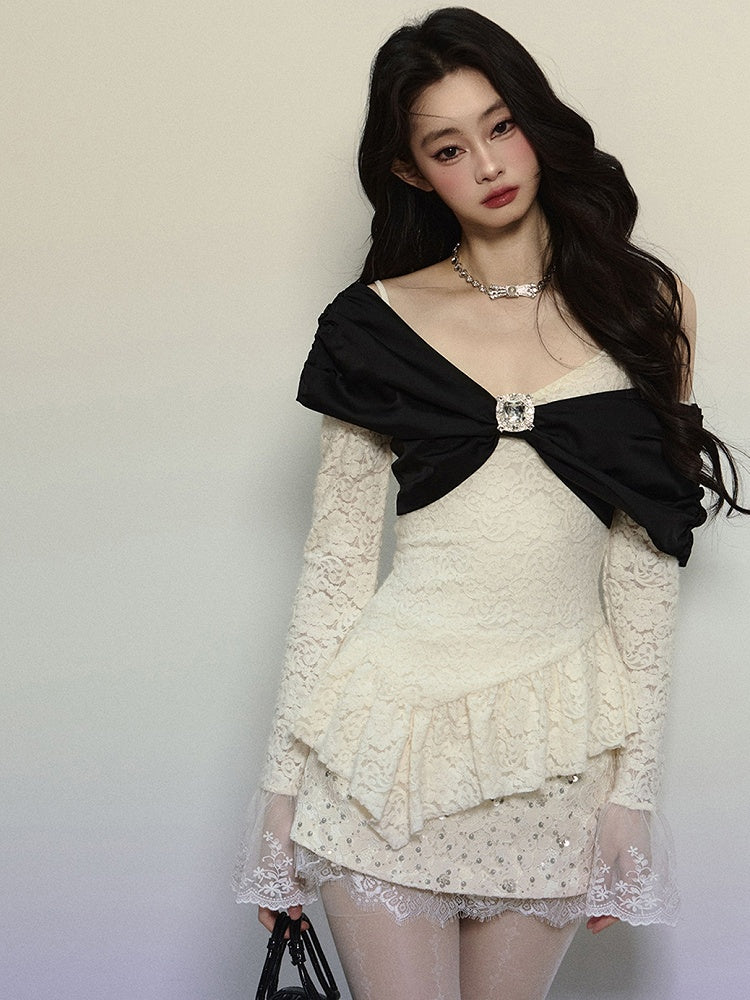 Aprikosenfarbenes Spitzentop mit großer Schleife, asymmetrischem Saum, V-Ausschnitt und langen Ärmeln